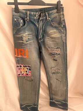Amiri Art Patch / Logo Appliqué Distressed Jeans – Blue